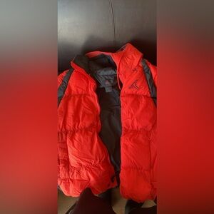 Red Puffer Jacket with Black Accents